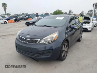 2013 Kia Rio SX with VIN KNADN4A30D6284121, listed as a IAAI auction lot 42109956 with 79,883 mi miles. Bid and sale history available at carsss.com. Image 2.