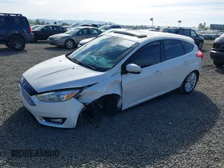 2017 Ford Focus Titanium with VIN 1FADP3N24HL308751, listed as a IAAI auction lot 42207247 with 109,736 mi miles and . Bid and sale history available at DreamBid. Image 2.