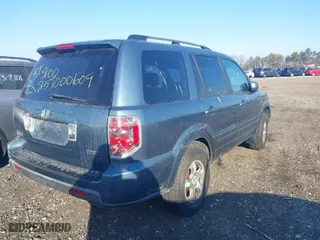 2008 Honda Pilot EX-L with VIN 5FNYF18588B030741, listed as a IAAI auction lot 41368390 with 999,999 mi miles. Bid and sale history available at carsss.com. Image 4.