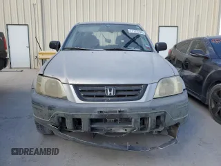 1999 Honda CR-V LX with VIN JHLRD2848XC011581, listed as a Copart auction lot 77183294 with 218,474 mi miles and Salvage Title. Bid and sale history available at carsss.com. Image 5.