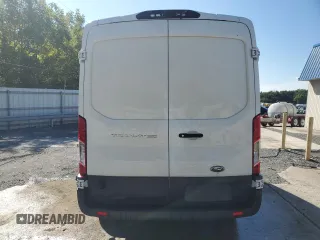 2018 Ford Transit z VIN 1FTYR2CM1JKB39451, wystawiony jako Copart lot #70852124 z przebiegiem 230 942 mil mil oraz Tytuł czysty. Historia ofert i sprzedaży dostępna na DreamBid. Obrazek 6.