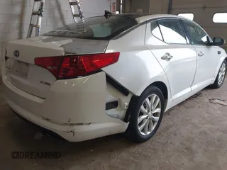 2012 Kia Optima EX with VIN 5XXGN4A65CG040331, listed as a IAAI auction lot 41903966 with 195,438 mi miles and . Bid and sale history available at carsss.com. Image 4.