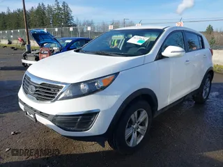 2012 Kia Sportage LX with VIN KNDPB3A24C7317060, listed as a IAAI auction lot 41725826 with 122,574 mi miles. Bid and sale history available at carsss.com. Image 2.