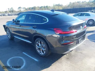 2020 BMW X4 xDrive30i with VIN 5UX2V1C07L9B83698, listed as a IAAI auction lot 41860487 with 51,891 mi miles. Bid and sale history available at carsss.com. Image 3.