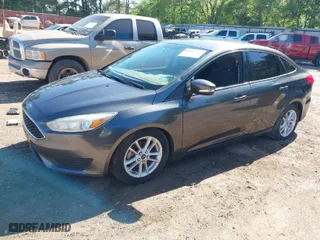 2015 Ford Focus SE with VIN 1FADP3F24FL219760, listed as a IAAI auction lot 41947221 with 163,259 mi miles. Bid and sale history available at carsss.com. Image 2.