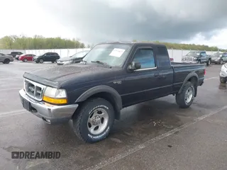 2000 Ford Ranger XLT with VIN 1FTZR15X7YTA72896, listed as a IAAI auction lot 42076823 with 123,037 mi miles. Bid and sale history available at carsss.com. Image 2.
