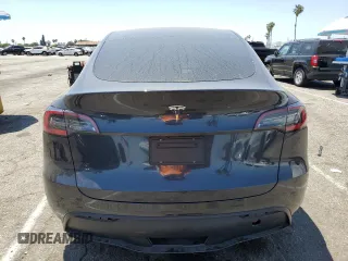 2024 Tesla Model Y с VIN 7SAYGDED5RF177307, выставлен на аукционе Copart как лот 57170315 с пробегом 14 726 миль миль и Списание • Salvage title. История ставок и продаж доступна на DreamBid. Изображение 6.