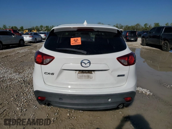 2015 Mazda CX-5 Grand Touring with VIN JM3KE2DY1F0453386, listed as a Copart auction lot 50580185 with 174,309 mi miles and Salvage Title. Bid and sale history available at carsss.com. Image 6.