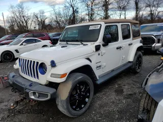 2021 Jeep Wrangler Unlimited Sahara with VIN 1C4JJXP62MW677073, listed as a Copart auction lot 87235634 with Not Provided miles and Salvage Title. Bid and sale history available at DreamBid. Image 1.