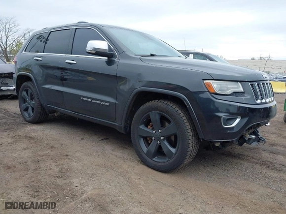 2014 Jeep Grand Cherokee Overland with VIN 1C4RJFCG6EC121654, listed as a IAAI auction lot 42051730 with 163,853 mi miles. Bid and sale history available at carsss.com. Image 1.