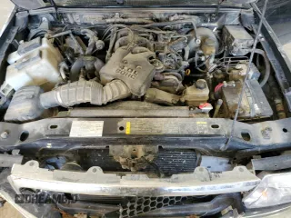 2004 Ford Ranger XL Fleet with VIN 1FTZR45E74PA84176, listed as a Copart auction lot 46949105 with 210,035 mi miles and Salvage Title. Bid and sale history available at DreamBid. Image 11.