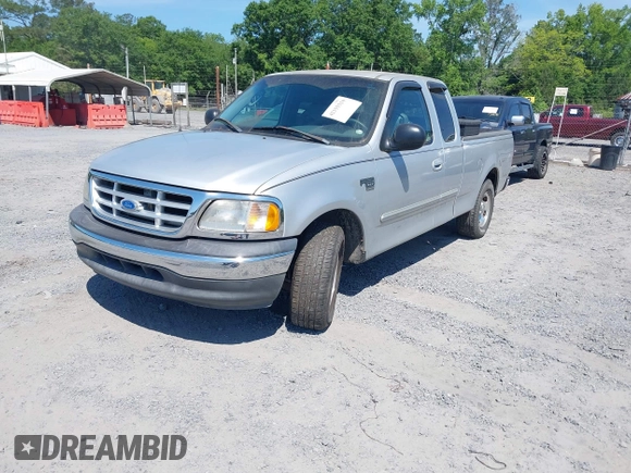 2003 Ford F-150 XL with VIN 1FTRX17W43NA77481, listed as a IAAI auction lot 42155310 with 230,322 mi miles. Bid and sale history available at carsss.com. Image 2.