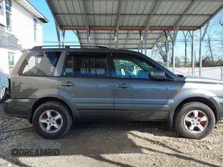 2007 Honda Pilot EX-L with VIN 5FNYF18777B012649, listed as a IAAI auction lot 42070873 with 167,419 mi miles and . Bid and sale history available at DreamBid. Image 13.
