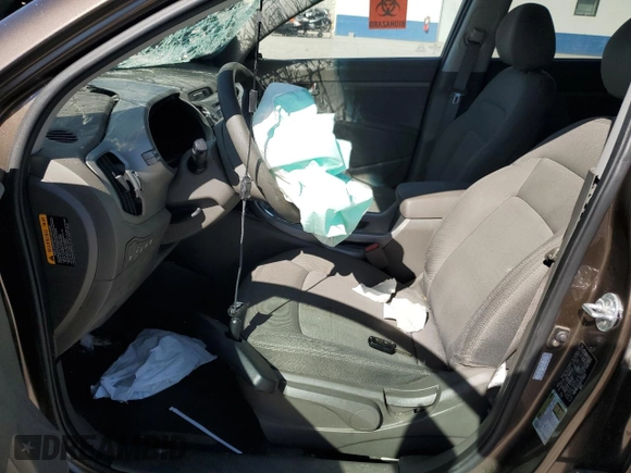 2013 Kia Sportage LX with VIN KNDPBCA23D7371824, listed as a Copart auction lot 60341775 with Not provided miles and Salvage title. Bid and sale history available at DreamBid. Image 7.