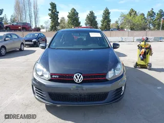 2013 Volkswagen GTI with VIN WVWHD7AJ2DW132851, listed as a IAAI auction lot 42021650 with 83,473 mi miles. Bid and sale history available at carsss.com. Image 12.