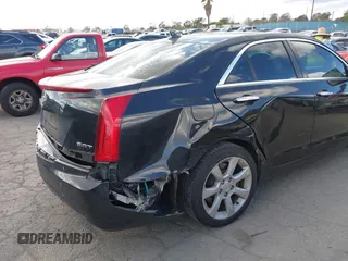 2013 Cadillac ATS z VIN 1G6AA5RX9D0167867, wystawiony jako IAAI lot #41945699 z przebiegiem 166 040 mil mil oraz . Historia ofert i sprzedaży dostępna na DreamBid. Obrazek 6.