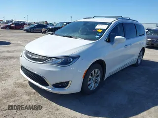 2018 Chrysler Pacifica Touring L with VIN 2C4RC1BG1JR119682, listed as a IAAI auction lot 41762362 with 167,380 mi miles and . Bid and sale history available at DreamBid. Image 2.