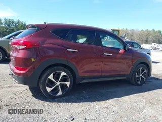2016 Hyundai Tucson Eco with VIN KM8J3CA29GU052657, listed as a IAAI auction lot 42170324 with 80,681 mi miles. Bid and sale history available at carsss.com. Image 13.