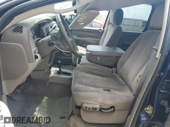 2003 Dodge 1500 ST z VIN 1D7HU18D43S243670, wystawiony jako Copart lot #56870715 z przebiegiem 148 297 mil mil oraz Nie do naprawy • Non repairable. Historia ofert i sprzedaży dostępna na DreamBid. Obrazek 7.
