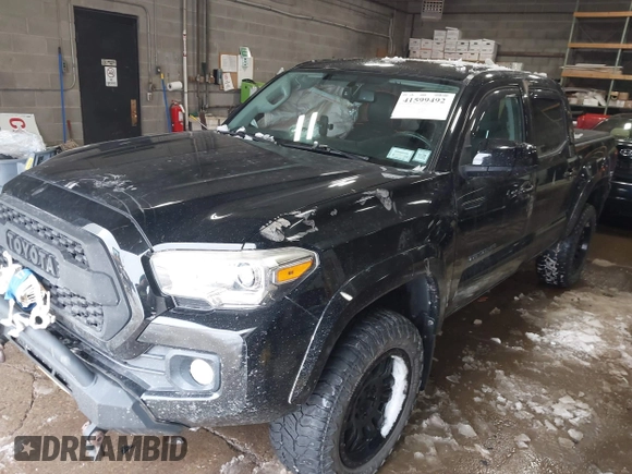 2016 Toyota Tacoma SR with VIN 3TMCZ5AN5GM037336, listed as a IAAI auction lot 41599492 with 76,262 mi miles. Bid and sale history available at carsss.com. Image 17.