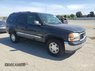 2004 GMC Yukon SLE z VIN 1GKEC13V94R131511, wystawiony jako Copart lot #53184435 z przebiegiem 163 917 mil mil oraz Tytuł czysty. Historia ofert i sprzedaży dostępna na DreamBid. Obrazek 4.