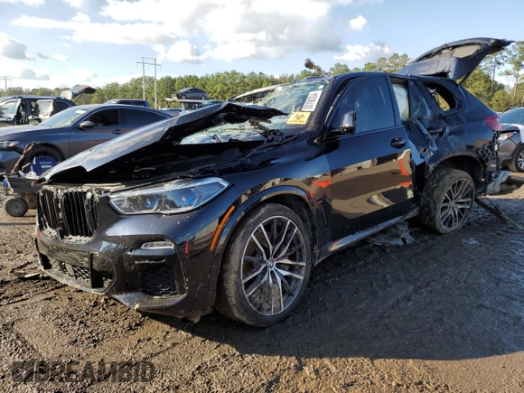 2020 BMW X5 M50i with VIN 5UXJU4C05LLE45415, listed as a Copart auction lot 80190304 with Not Provided miles and Salvage Title. Bid and sale history available at DreamBid. Image 1.