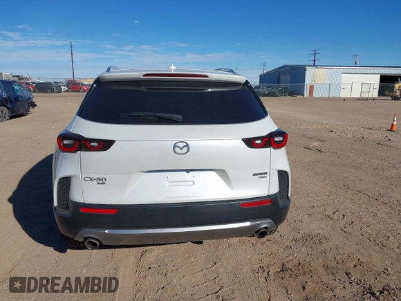 2024 Mazda CX-50 Premium z VIN 7MMVABDY0RN186511, wystawiony jako IAAI lot #41229255 z przebiegiem 21 842 mil mil oraz . Historia ofert i sprzedaży dostępna na DreamBid. Obrazek 16.