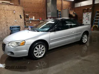 2004 Chrysler Sebring GTC with VIN 1C3EL75R54N327309, listed as a Copart auction lot 46127865 with 120,715 mi miles and Salvage Title. Bid and sale history available at DreamBid. Image 1.