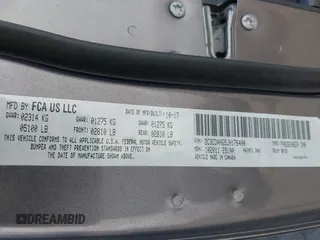 2018 Dodge Charger SXT Plus with VIN 2C3CDXHG9JH176400, listed as a IAAI auction lot 42128281 with 198,766 mi miles and . Bid and sale history available at carsss.com. Image 9.