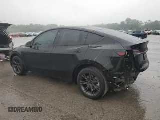 2024 Tesla Model Y с VIN 7SAYGDED9RF195941, выставлен на аукционе Copart как лот 58372205 с пробегом 12 289 миль миль и Списание • Salvage title. История ставок и продаж доступна на DreamBid. Изображение 2.