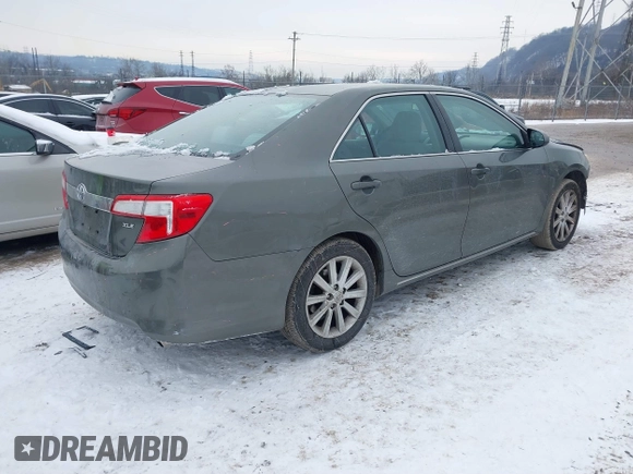 2014 Toyota Camry L with VIN 4T1BF1FK5EU774116, listed as a IAAI auction lot 41286569 with 184,797 mi miles. Bid and sale history available at carsss.com. Image 4.