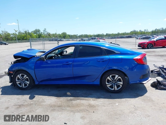 2018 Honda Civic LX with VIN 19XFC2F54JE027744, listed as a IAAI auction lot 42038398 with 119,250 mi miles and . Bid and sale history available at DreamBid. Image 14.
