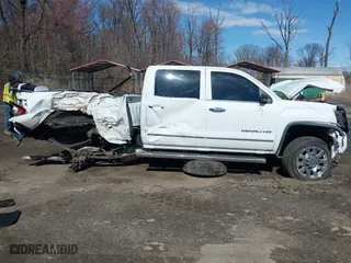 2017 GMC Sierra 2500HD Denali with VIN 1GT12UEG1HF166208, listed as a IAAI auction lot 41806983 with 144,862 mi miles. Bid and sale history available at carsss.com. Image 13.