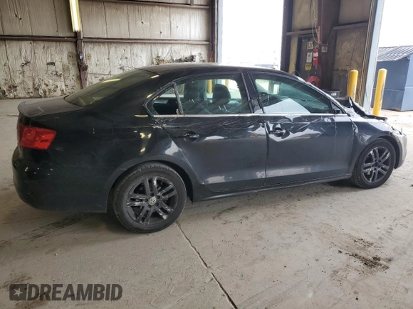 2013 Volkswagen Jetta SE with VIN 3VWDX7AJXDM427263, listed as a Copart auction lot 52502585 with 243,457 mi miles and Salvage title. Bid and sale history available at DreamBid. Image 3.