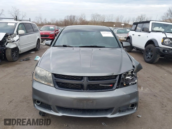 2013 Dodge Avenger SXT with VIN 1C3CDZCB7DN746154, listed as a IAAI auction lot 41834458 with 161,906 mi miles and . Bid and sale history available at DreamBid. Image 12.