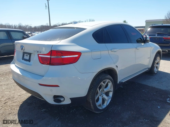 2011 BMW X6 35i with VIN 5UXFG2C58BLX07890, listed as a IAAI auction lot 42067800 with 144,367 mi miles. Bid and sale history available at carsss.com. Image 4.