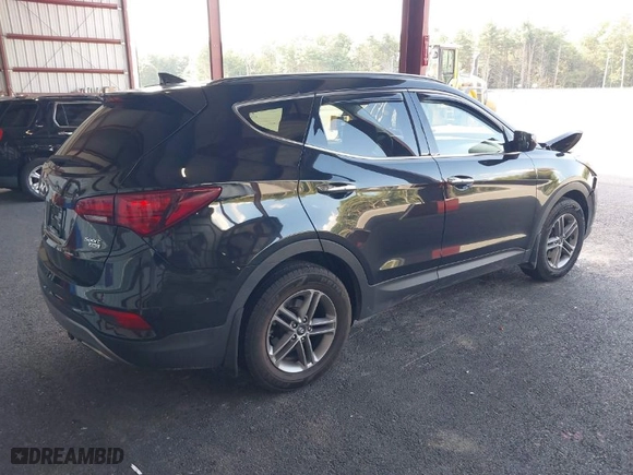 2017 Hyundai Santa Fe Sport 2.4L with VIN 5NMZUDLB9HH031727, listed as a IAAI auction lot 40141535 with 90,163 mi miles. Bid and sale history available at carsss.com. Image 4.