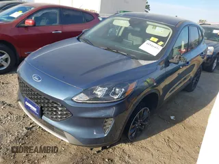 2020 Ford Escape SE Sport Hybrid with VIN 1FMCU9BZ2LUC50527, listed as a IAAI auction lot 41816035 with 84,533 mi miles and . Bid and sale history available at DreamBid. Image 17.