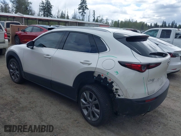 2023 Mazda CX-30 2.5 S Premium Package with VIN 3MVDMBDM7PM522287, listed as a IAAI auction lot 42052660 with 41,336 mi miles. Bid and sale history available at carsss.com. Image 3.