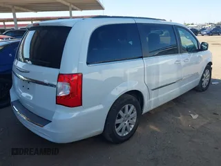 2014 Chrysler Town & Country Touring with VIN 2C4RC1BG8ER434940, listed as a IAAI auction lot 42483562 with 162,625 mi miles and . Bid and sale history available at DreamBid. Image 4.