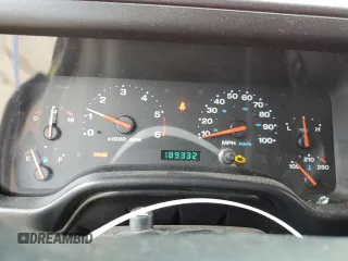 2005 Jeep Wrangler Sport z VIN 1J4FA49S75P317995, wystawiony jako Copart lot #58060055 z przebiegiem 189 332 mil mil oraz Szkoda całkowita • Salvage title. Historia ofert i sprzedaży dostępna na DreamBid. Obrazek 9.