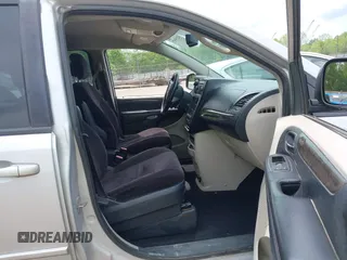 2011 Dodge Grand Caravan SXT with VIN 2D4RN4DGXBR600799, listed as a IAAI auction lot 42159972 with 257,571 mi miles and . Bid and sale history available at DreamBid. Image 5.