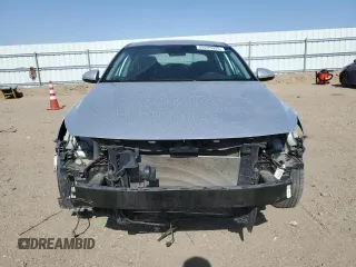 2019 Kia Optima LX z VIN 5XXGT4L31KG329150, wystawiony jako Copart lot #59225935 z przebiegiem 58 253 mil mil oraz Szkoda całkowita • Salvage title. Historia ofert i sprzedaży dostępna na DreamBid. Obrazek 5.