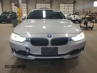 2014 BMW 3 Series 328i xDrive with VIN WBA3G7C50EKN37632, listed as a Copart auction lot 54827855 with 169,008 mi miles and Clean title. Bid and sale history available at DreamBid. Image 5.