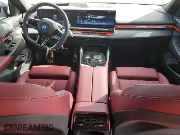 2024 BMW i5 eDrive40 with VIN WBY33FK09RCR50159, listed as a Copart auction lot 55520615 with 12,564 mi miles and Salvage title. Bid and sale history available at DreamBid. Image 8.