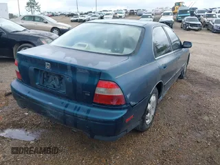 1994 Honda Accord LX with VIN 1HGCD5635RA157273, listed as a IAAI auction lot 41909466 with 196,202 mi miles. Bid and sale history available at carsss.com. Image 4.