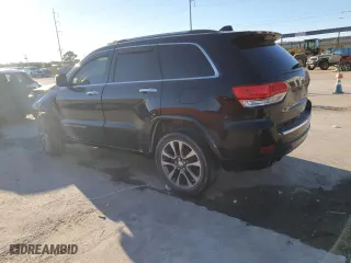 2017 Jeep Grand Cherokee Overland with VIN 1C4RJECGXHC659417, listed as a Copart auction lot 80168894 with 118,934 mi miles and Salvage Title. Bid and sale history available at carsss.com. Image 2.