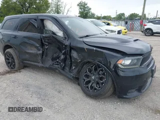 2019 Dodge Durango R/T with VIN 1C4SDJCT6KC585676, listed as a IAAI auction lot 42350845 with 138,524 mi miles and . Bid and sale history available at DreamBid. Image 1.