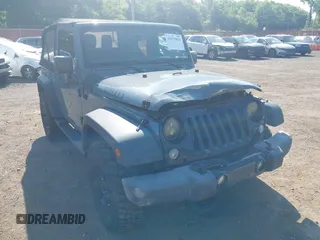 2015 Jeep Wrangler Freedom Edition with VIN 1C4AJWAG1FL714002, listed as a IAAI auction lot 42579024 with 98,732 mi miles and . Bid and sale history available at DreamBid. Image 17.