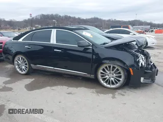 2013 Cadillac XTS Platinum z VIN 2G61V5S37D9194227, wystawiony jako IAAI lot #41510449 z przebiegiem 114 243 mil mil oraz . Historia ofert i sprzedaży dostępna na DreamBid. Obrazek 13.